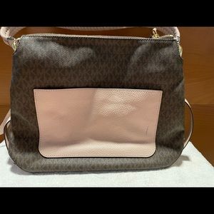 MK should bag beautiful classic MK signature brown with pink contrast.